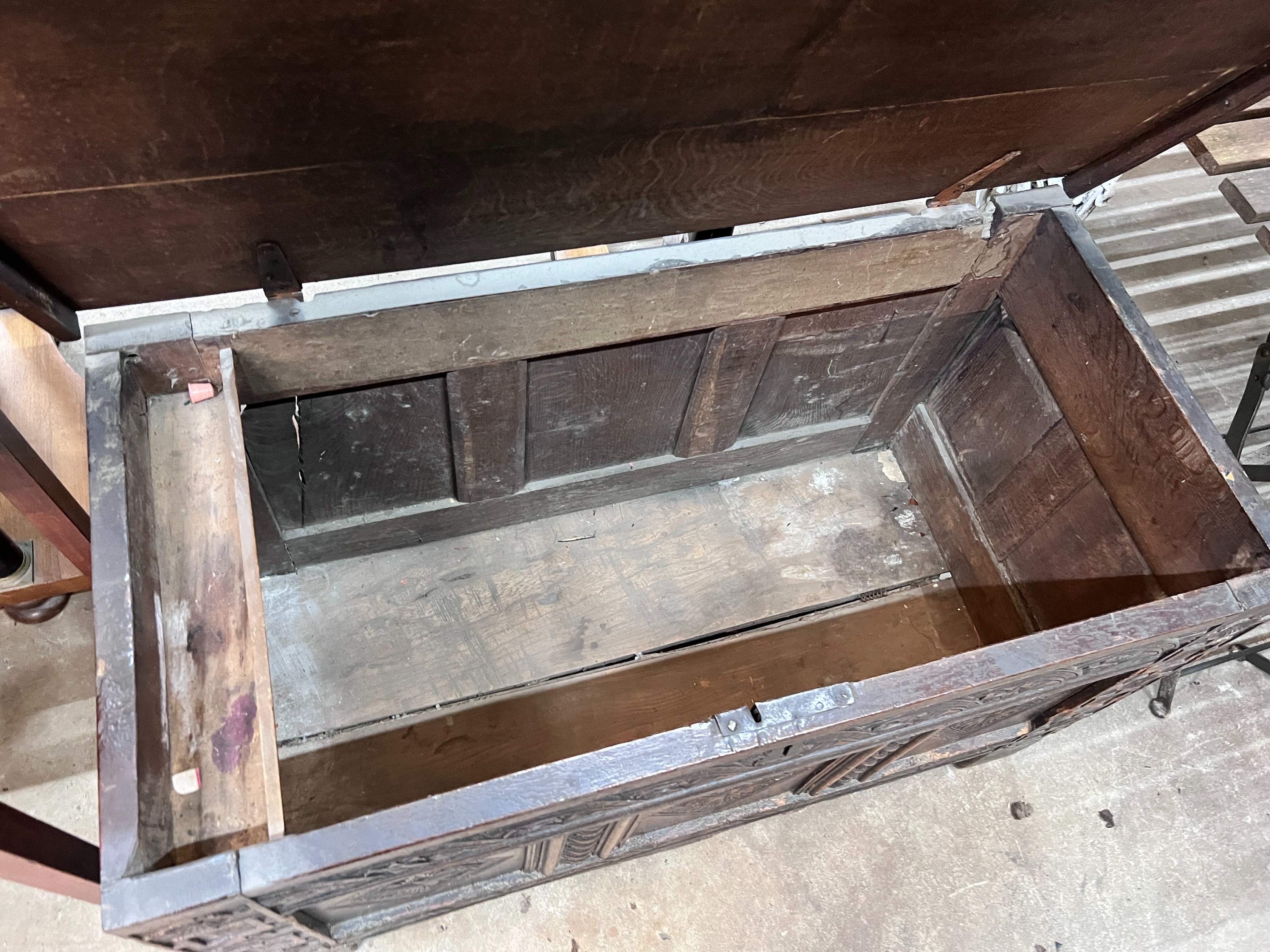 An 18th century and later carved oak coffer, width 108cm, depth 54cm, height 66cm *Please note the sale commences at 9am.